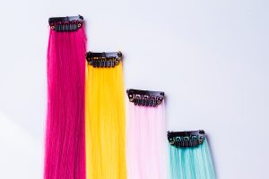 Color clip in hair extension closeup on white